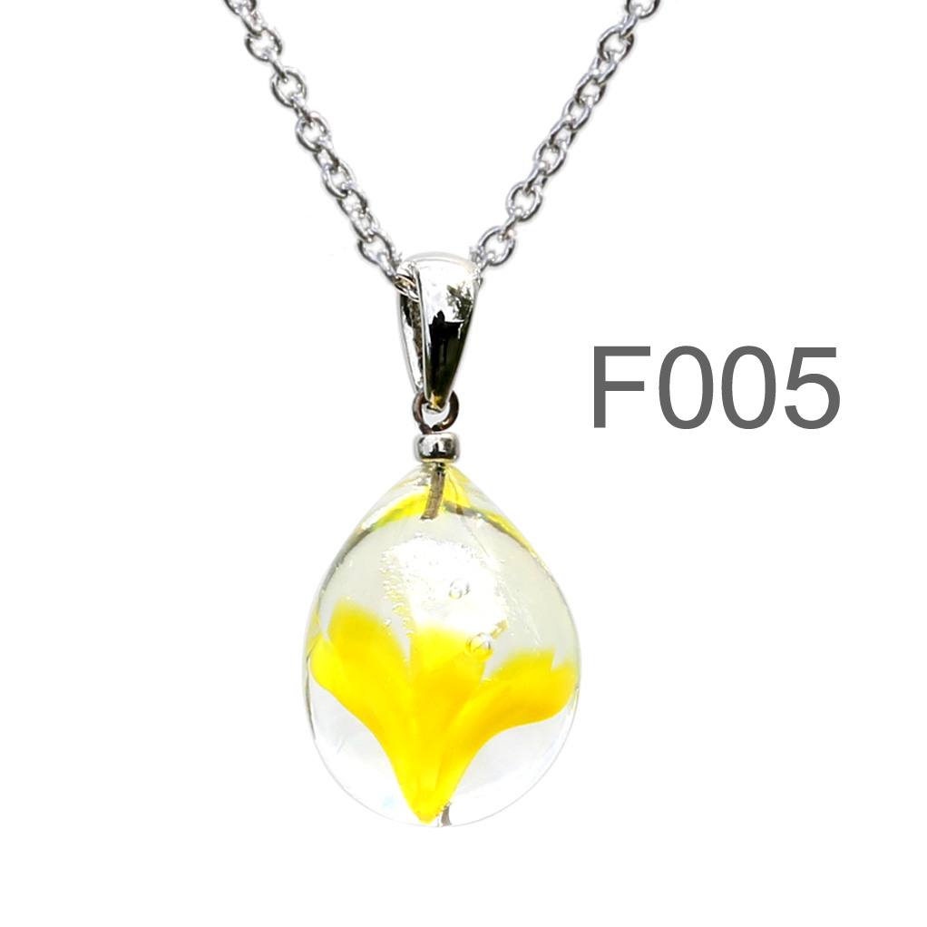 蛍光風イエロー 色のグラデーションが美しい ガラスの遺骨ペンダント