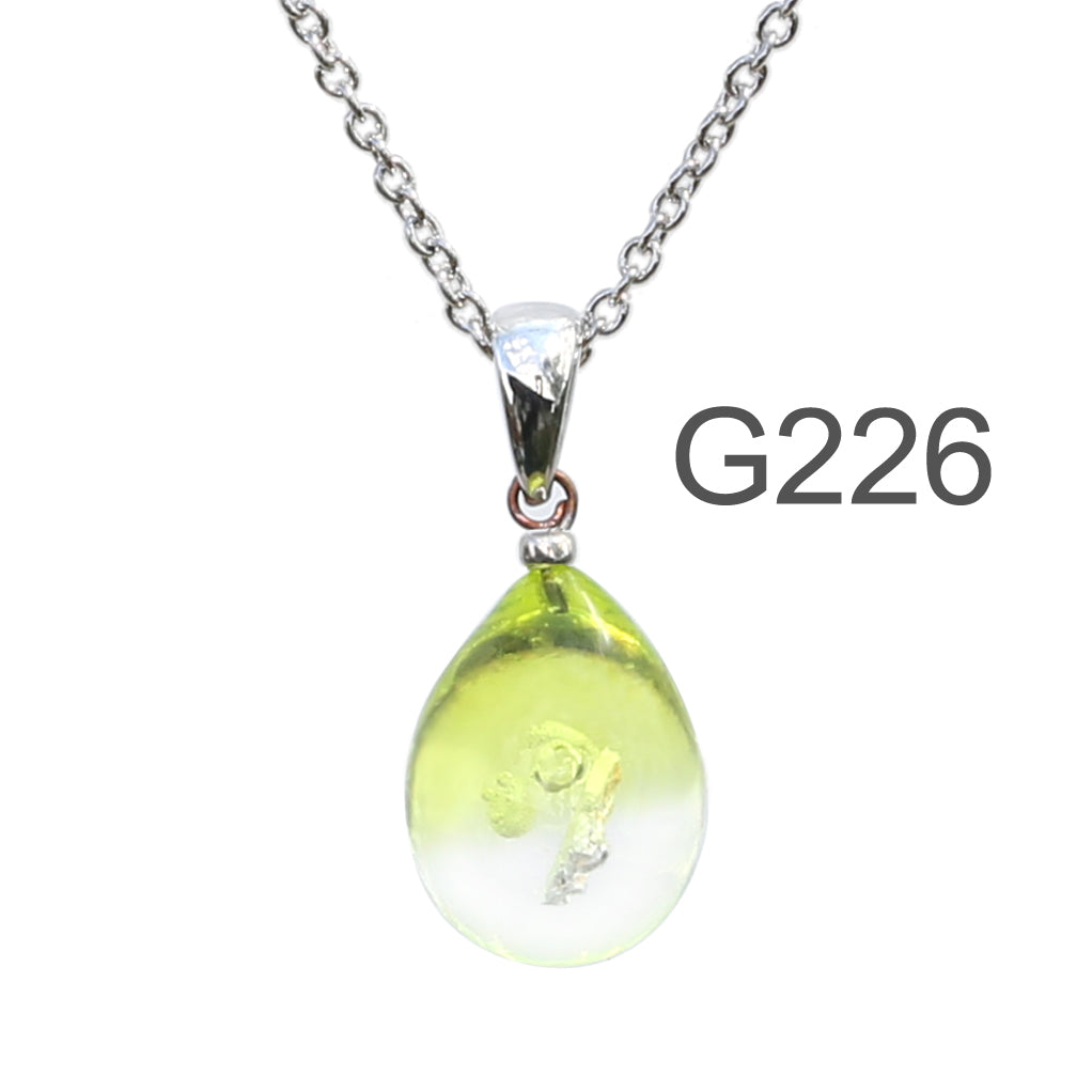 黄緑クリア色のグラデーションが美しい ガラスの遺骨ペンダント