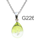 黄緑クリア色のグラデーションが美しい ガラスの遺骨ペンダント