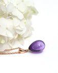 パープル薄パープル色のグラデーションが美しい ガラスの遺骨ペンダント