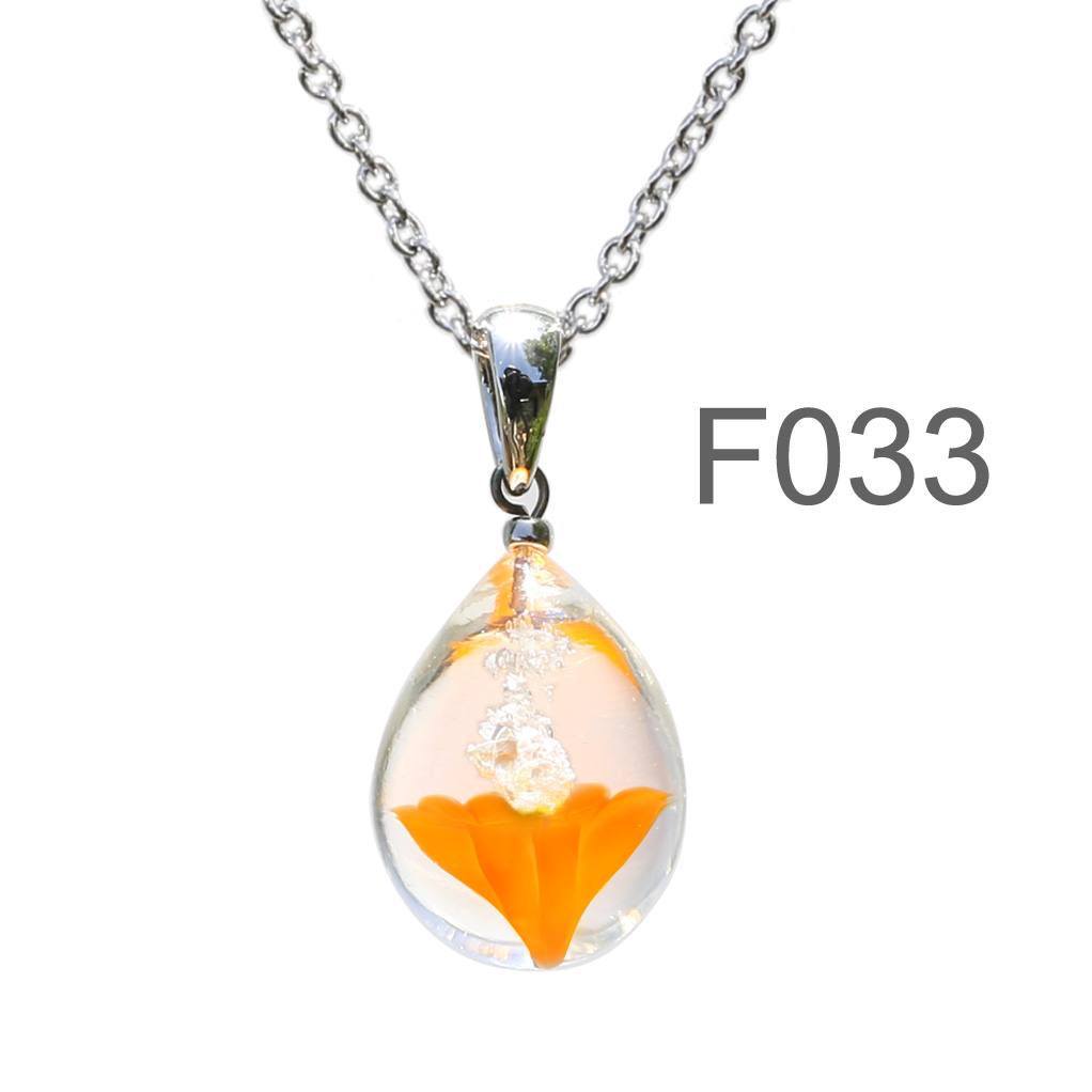 オレンジ色のお花が入った ガラスの遺骨ペンダント