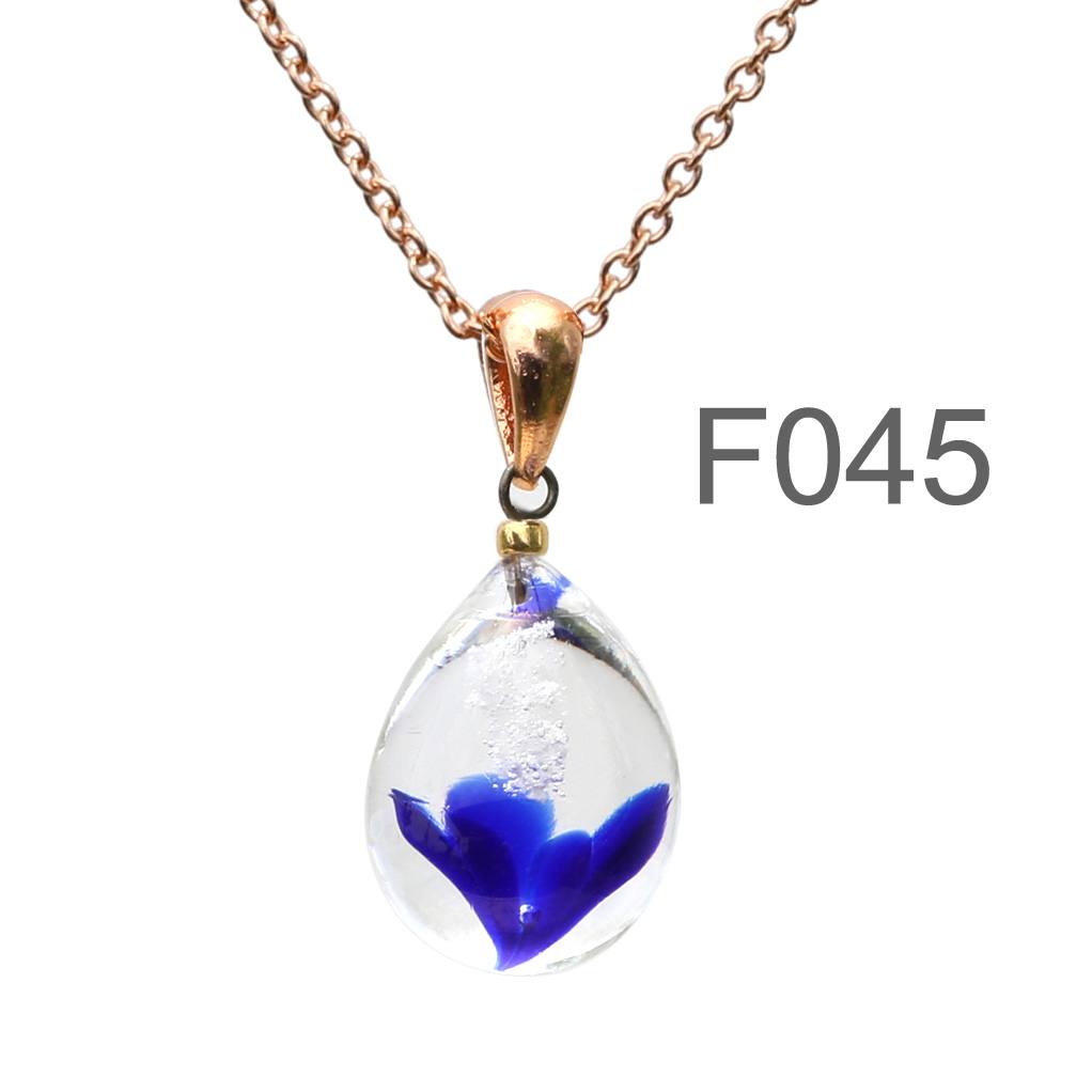 ロイヤルブルー色のお花が入った ガラスの遺骨ペンダント