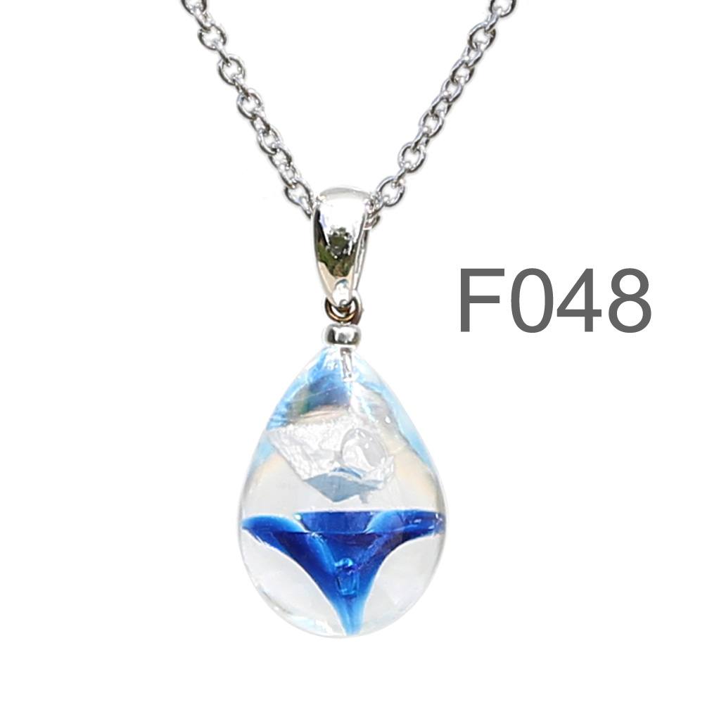 特濃ブルー色のお花が入った ガラスの遺骨ペンダント