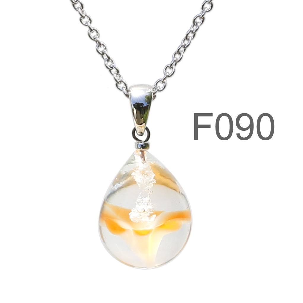 半透明白オレンジ色のお花が入った ガラスの遺骨ペンダント