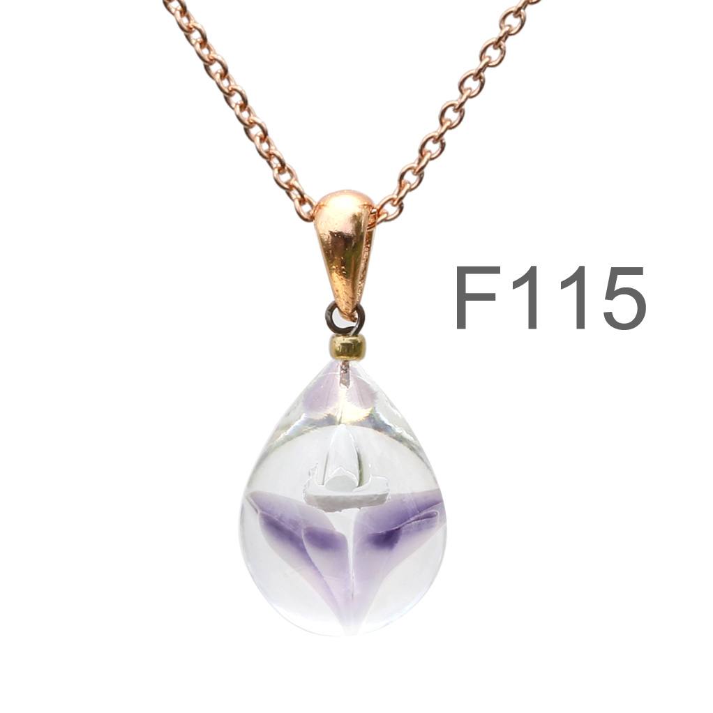 薄紫色のお花が入った ガラスの遺骨ペンダント