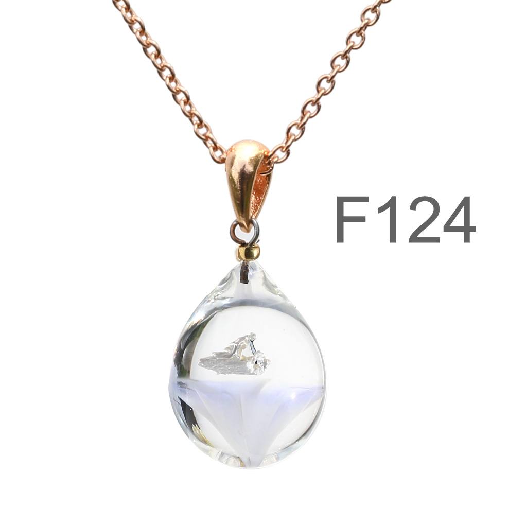 薄紫半透明白色のお花が入った ガラスの遺骨ペンダント