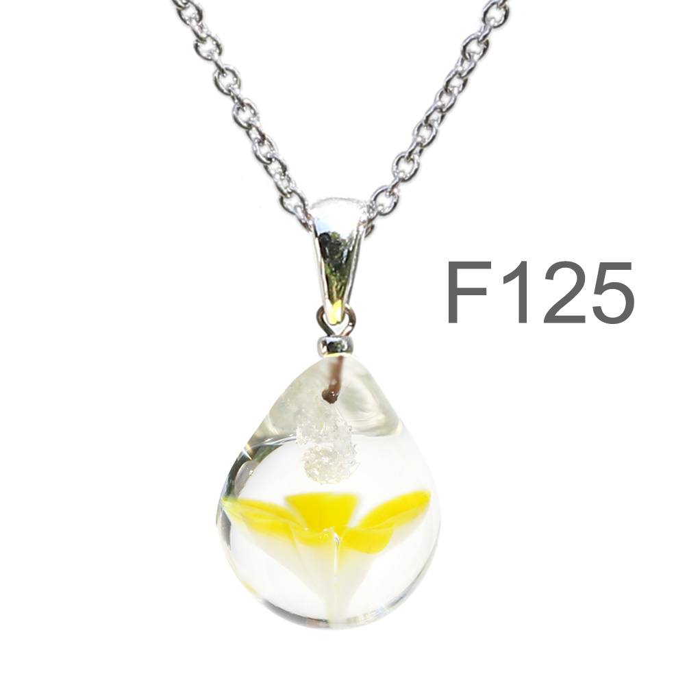 黄色半透明白色のお花が入った ガラスの遺骨ペンダント