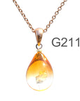 オレンジクリア色のグラデーションが美しい ガラスの遺骨ペンダント