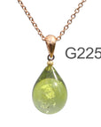 黄緑薄グレー色のグラデーションが美しい ガラスの遺骨ペンダント