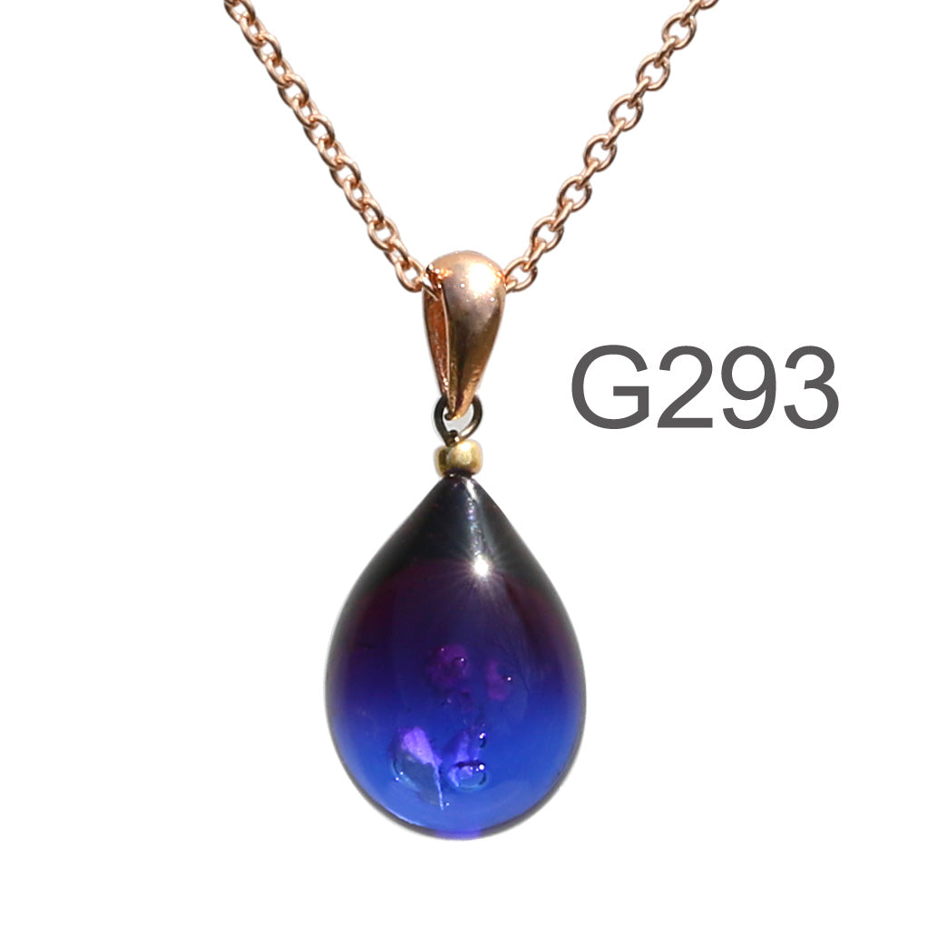 金赤青紫色のグラデーションが美しい ガラスの遺骨ペンダント