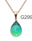 青薄グリーン色のグラデーションが美しい ガラスの遺骨ペンダント