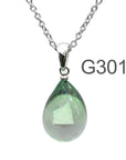 薄グリーン薄グレー色のグラデーションが美しい ガラスの遺骨ペンダント