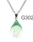 薄グリーンクリア色のグラデーションが美しい ガラスの遺骨ペンダント