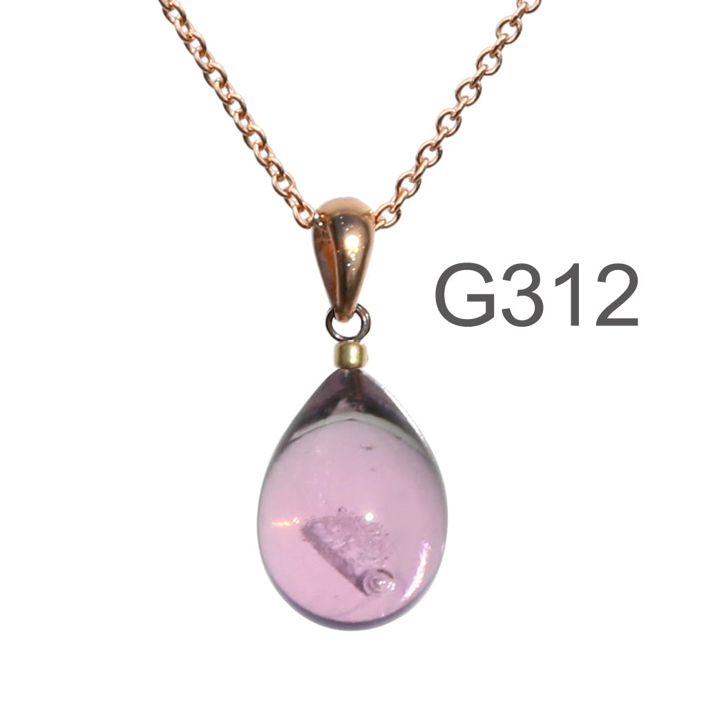 薄グレー薄ピンク色のグラデーションが美しい ガラスの遺骨ペンダント