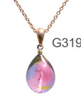 オーロラピンク色のグラデーションが美しい ガラスの遺骨ペンダント