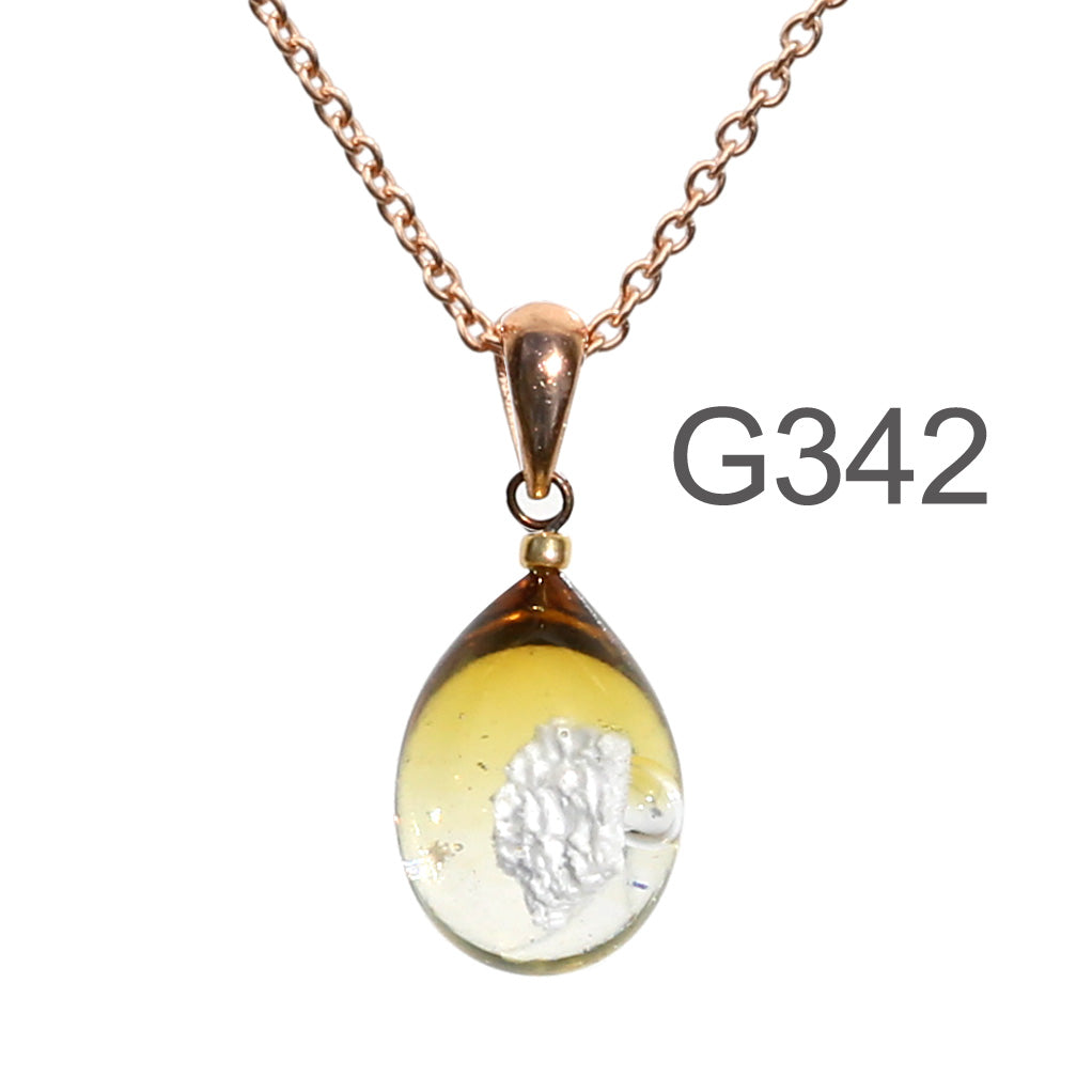 薄茶クリア色のグラデーションが美しい ガラスの遺骨ペンダント
