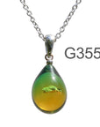 青緑アンバー色のグラデーションが美しい ガラスの遺骨ペンダント