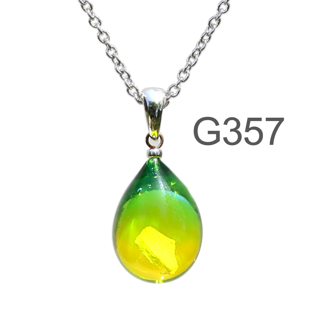 青緑イエロー色のグラデーションが美しい ガラスの遺骨ペンダント
